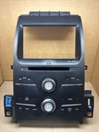 2014 Ford Taurus Radio Control Face Panel Bezel EG1T-18A802-DB. Fixed Price $100.00.
