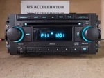 Genuine 2004 - 2010 Chrysler Dodge Jeep Factory Radio MP3 Cd Player Ref W/ Aux. Fixed Price $106.97.